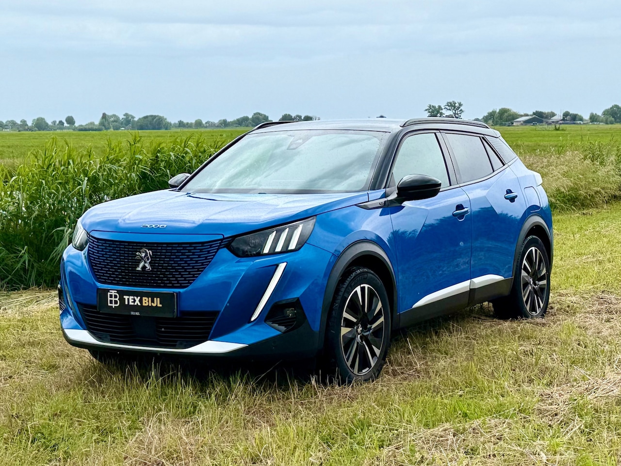 Peugeot e-2008 - EV GT Pack 50 kWh 3-Fase|SoH 88.7%|Keyless|navi|18-inch - AutoWereld.nl