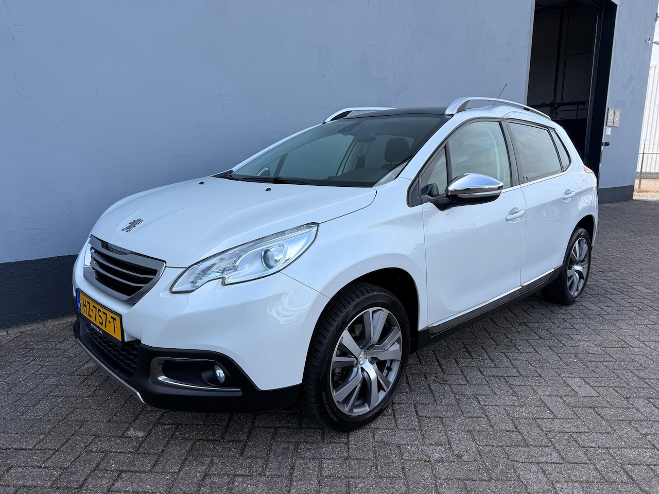 Peugeot 2008 - 1.2 PureTech Allure - Panorama Dak - AutoWereld.nl