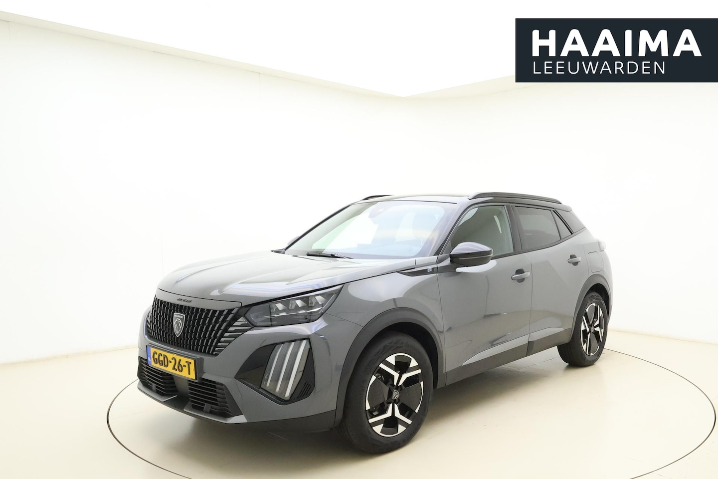 Peugeot e-2008 - EV GT 54 kWh | Achteruitrijcamera | Dakrails | Cruise control | Climate control | Navigati - AutoWereld.nl