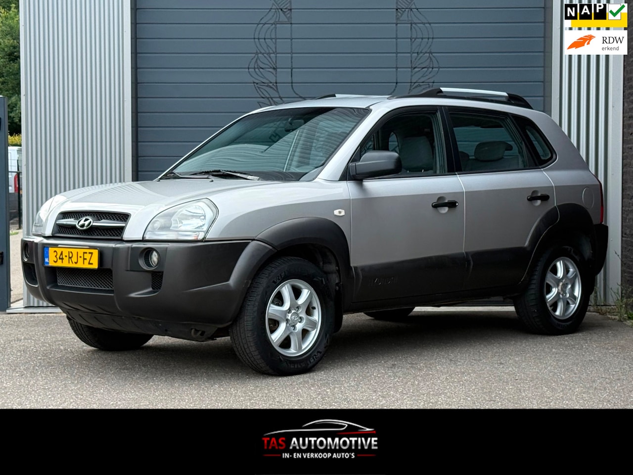 Hyundai Tucson - 2.0i Active AIRCO / 104.699 KM / NAP / APK - AutoWereld.nl