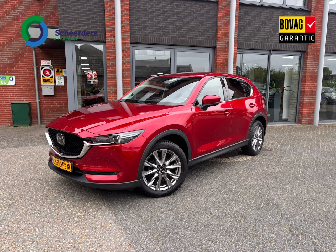 Mazda CX-5 - 2.5 4WD SkyActiv-G 194 Signature 2.5 4WD SkyActiv-G 194 Signature,Leder,Navi,Carplay,1 jaar Bovag garantie - AutoWereld.nl