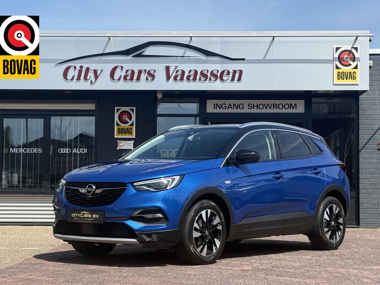 Opel Grandland X - 1.2 Turbo Ultimate 131 pk automaat org nl auto nap logisch full options navi apple carplay - AutoWereld.nl