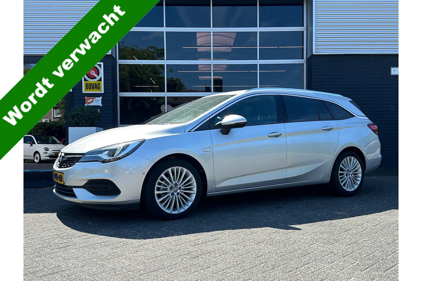 Opel Astra Sports Tourer - 1.2 Elegance 1.2 Elegance, Airco, Bluetooth, Camera, CarPlay, Cruise, Navi, Lane Assist, NAP - AutoWereld.nl