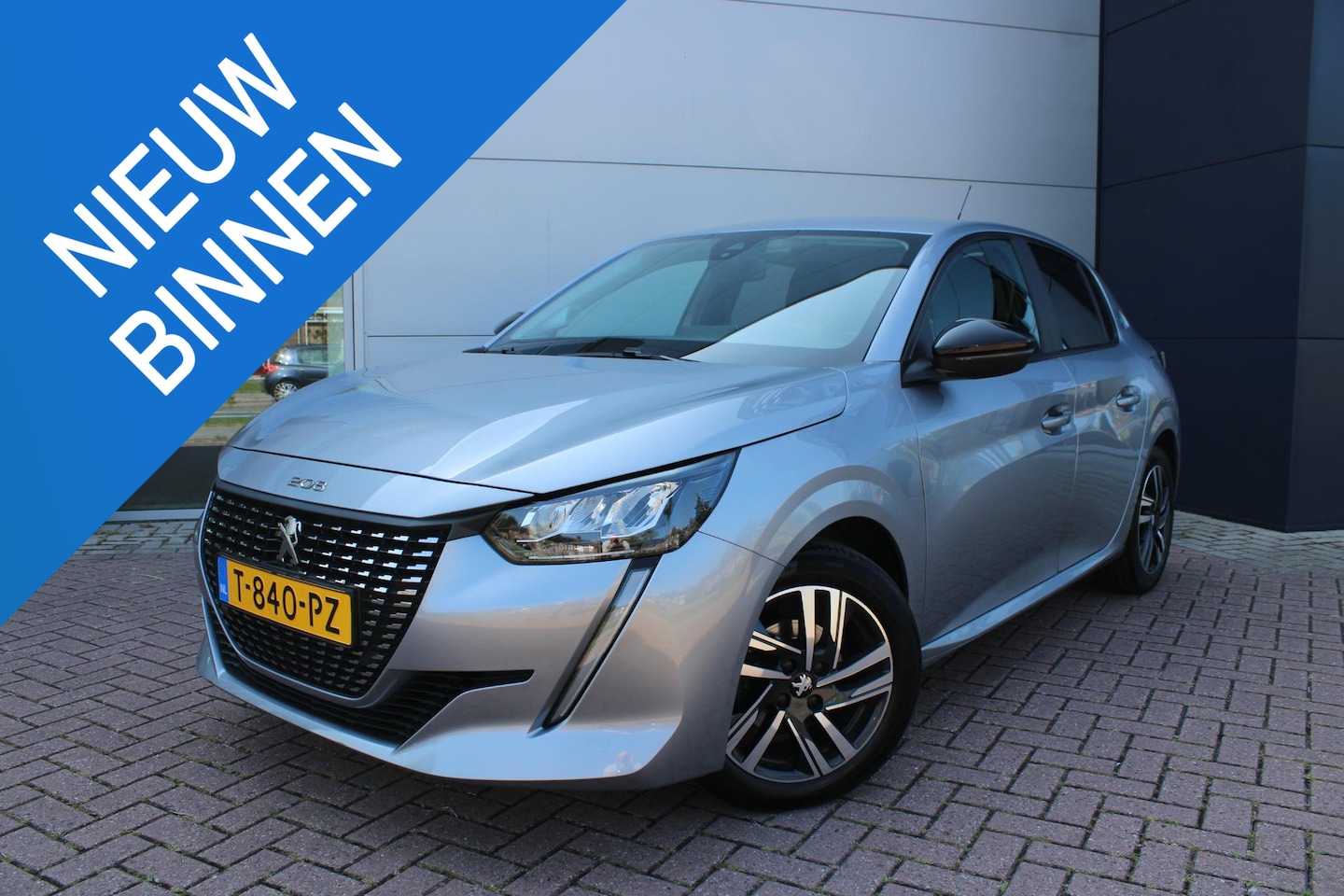 Peugeot 208 - 1.2 PureTech Style Airco Navi Camera Carplay Dealer onderhouden - AutoWereld.nl