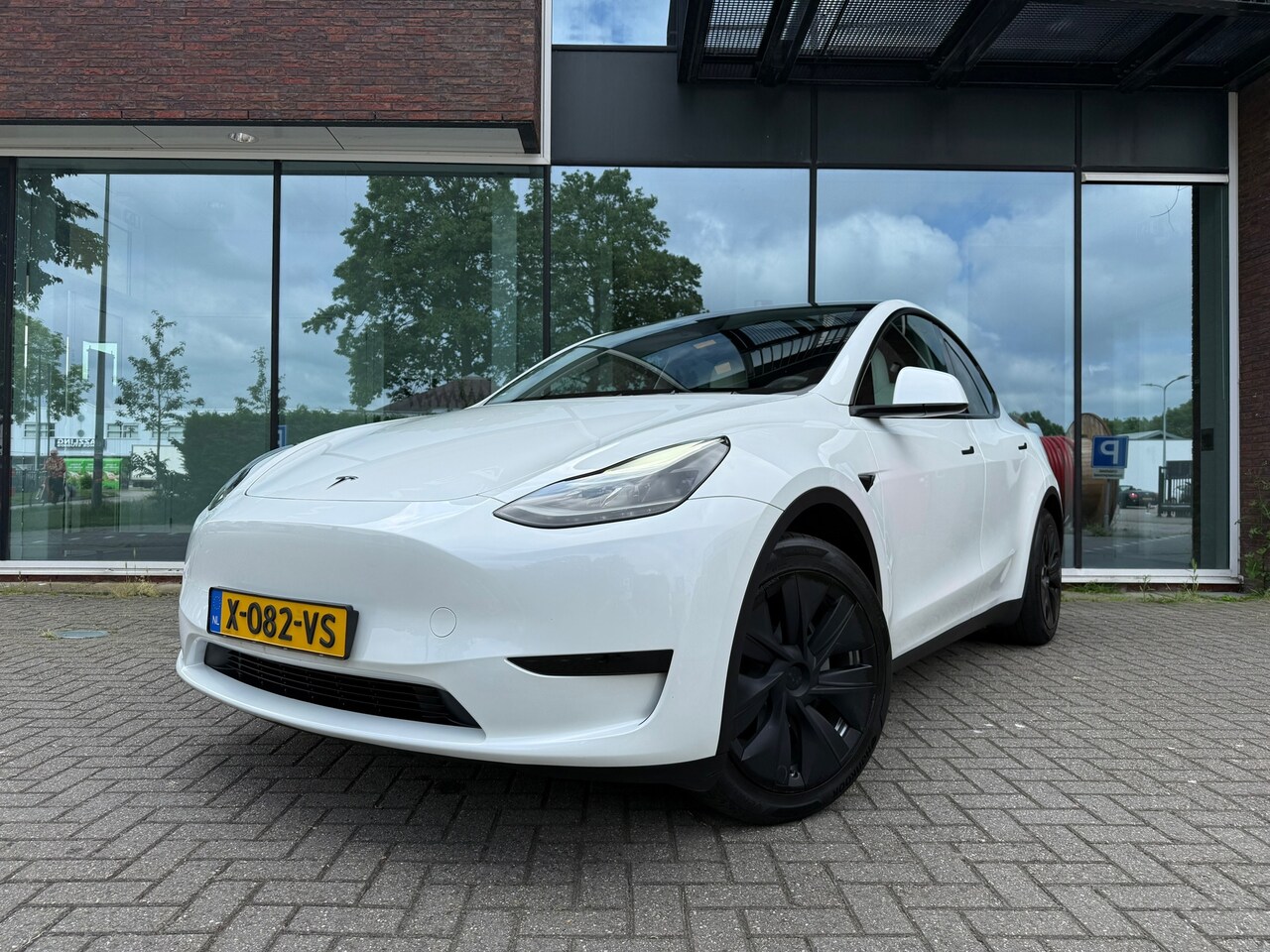 Tesla Model Y - RWD 58 kWh - Navi - Leder - Panoramadak - Org.NL - AutoWereld.nl