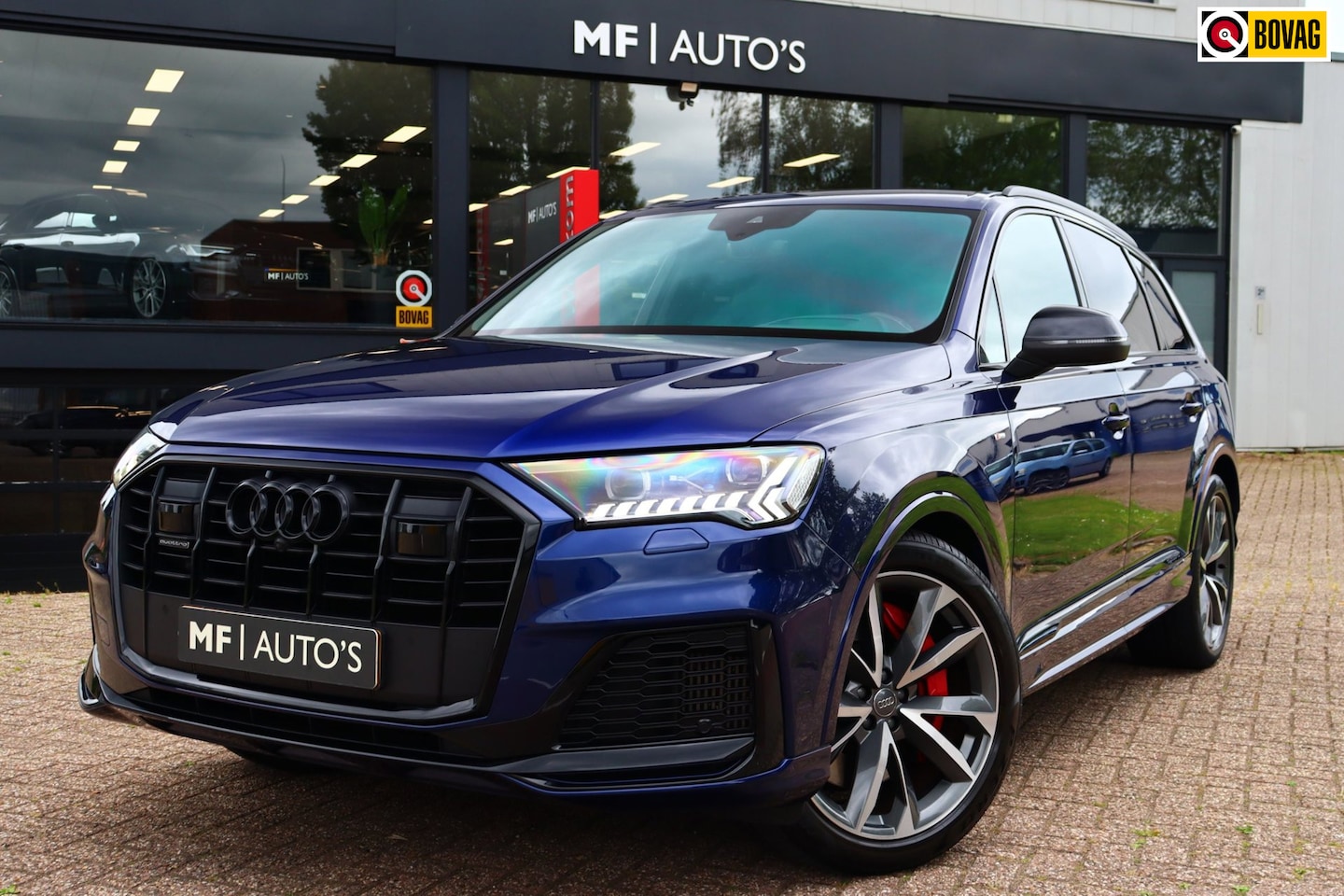 Audi Q7 - 60 TFSI e Quattro Competition S-line|Luchtvering|Laser|ACC|HUD|Sfeer|Bose|Trekhaak - AutoWereld.nl