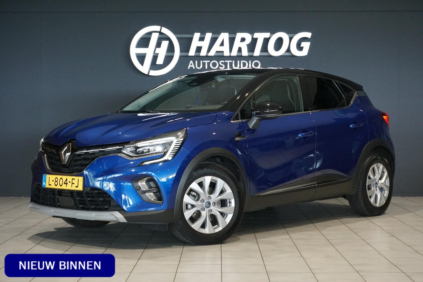 Renault Captur - 1.6 E-Tech Plug-in Hybrid 160 Intens *DEALER ONDERHOUDEN* + CAMERA / APPLE CARPLAY - AutoWereld.nl