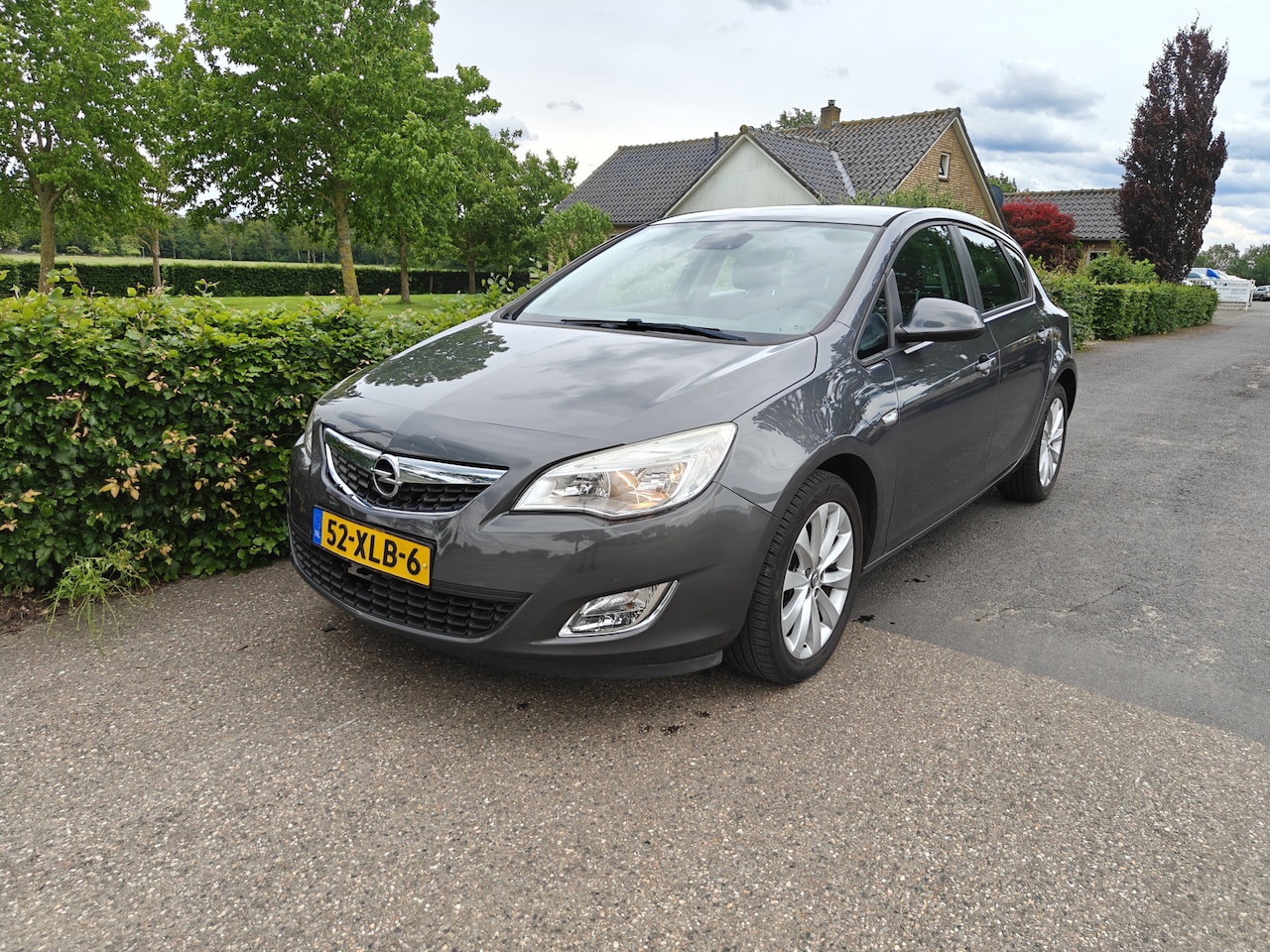 Opel Astra - 1.4 Anniversary Edition AIRCO/NAVI BJ 2012 - AutoWereld.nl
