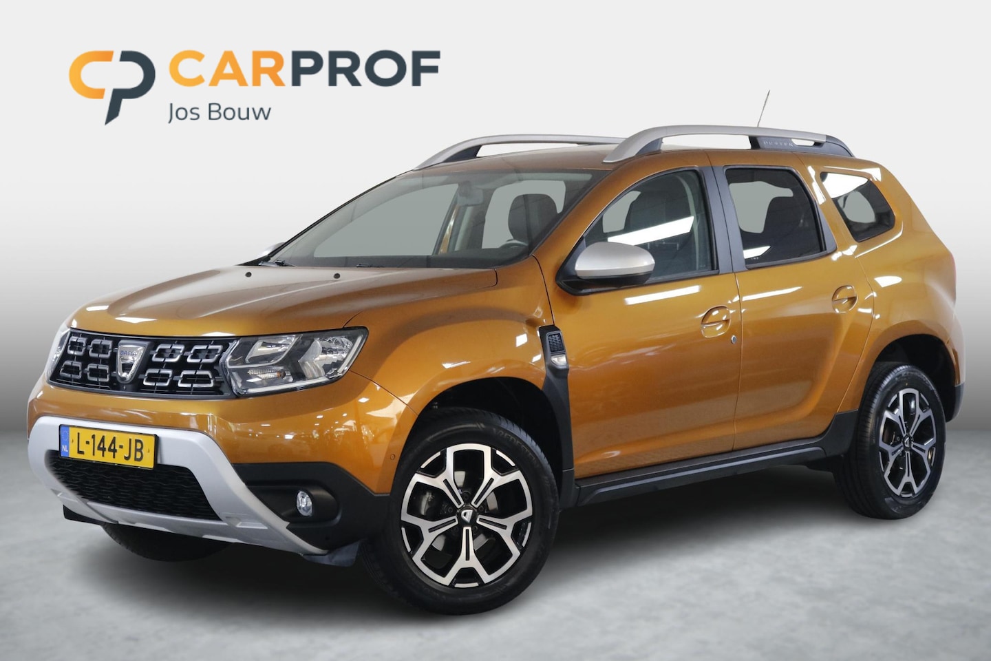 Dacia Duster - 1.3 TCe Prestige Clima | Cruise | Camera's | Carplay | Leder | Volle uitvoering! - AutoWereld.nl
