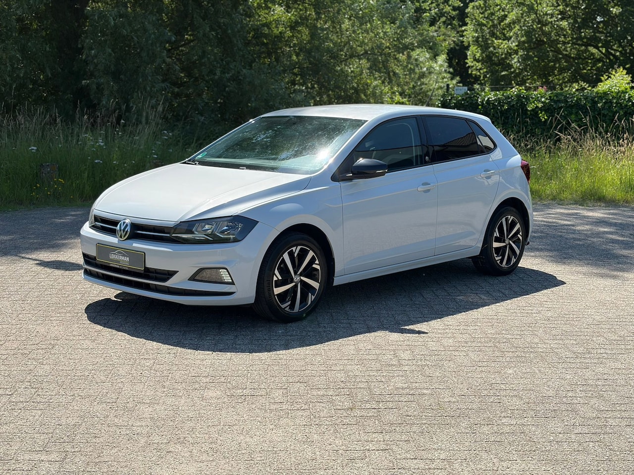 Volkswagen Polo - 1.0 High Line BEATS I BLUETOOTH I PDC I CLIMA I STOELVERW - AutoWereld.nl