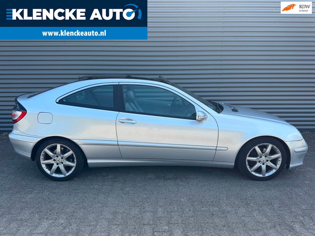 Mercedes-Benz C-klasse Sportcoupé - 180 K AUTOMAAT Panoramadak Leer Cruise ctrl Schuifdak 269.296km - AutoWereld.nl