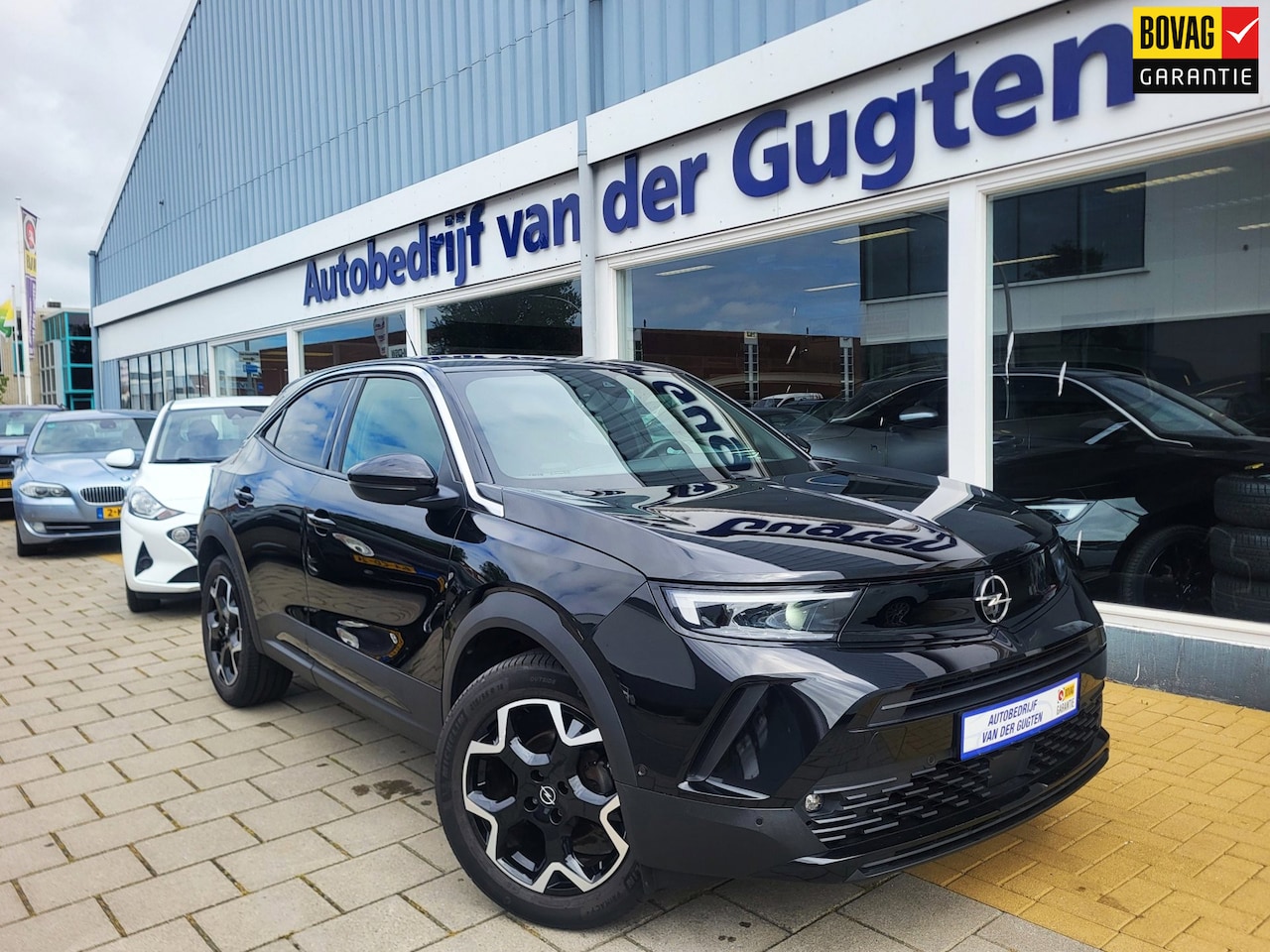 Opel Mokka - 1.2 Turbo Ultimate / Carplay & Android / Camera / Stuur -en Stoelverwarming / - AutoWereld.nl