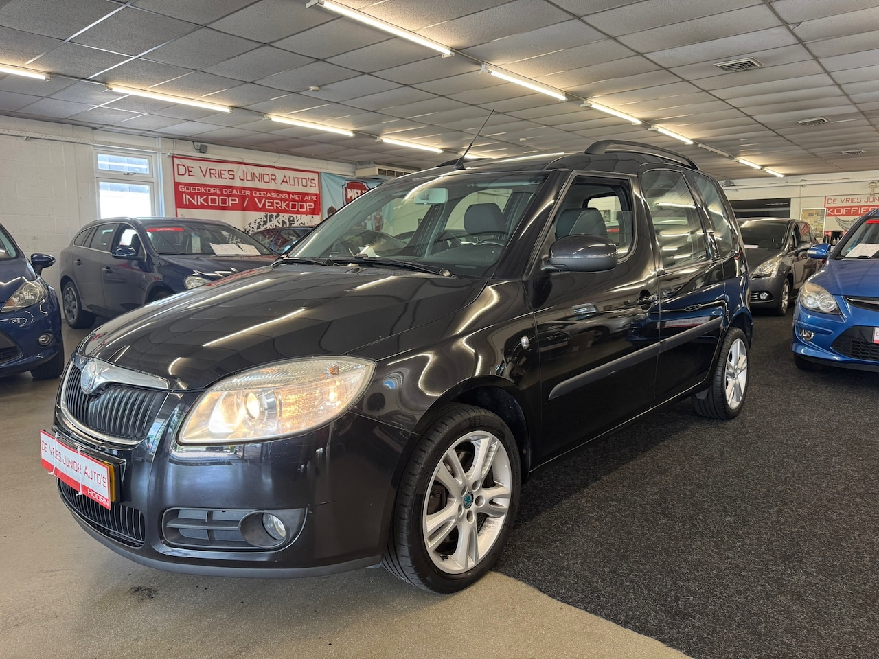 Skoda Roomster - 1.6-16V Sport. Cruise control, trekhaak, navi en meer! - AutoWereld.nl
