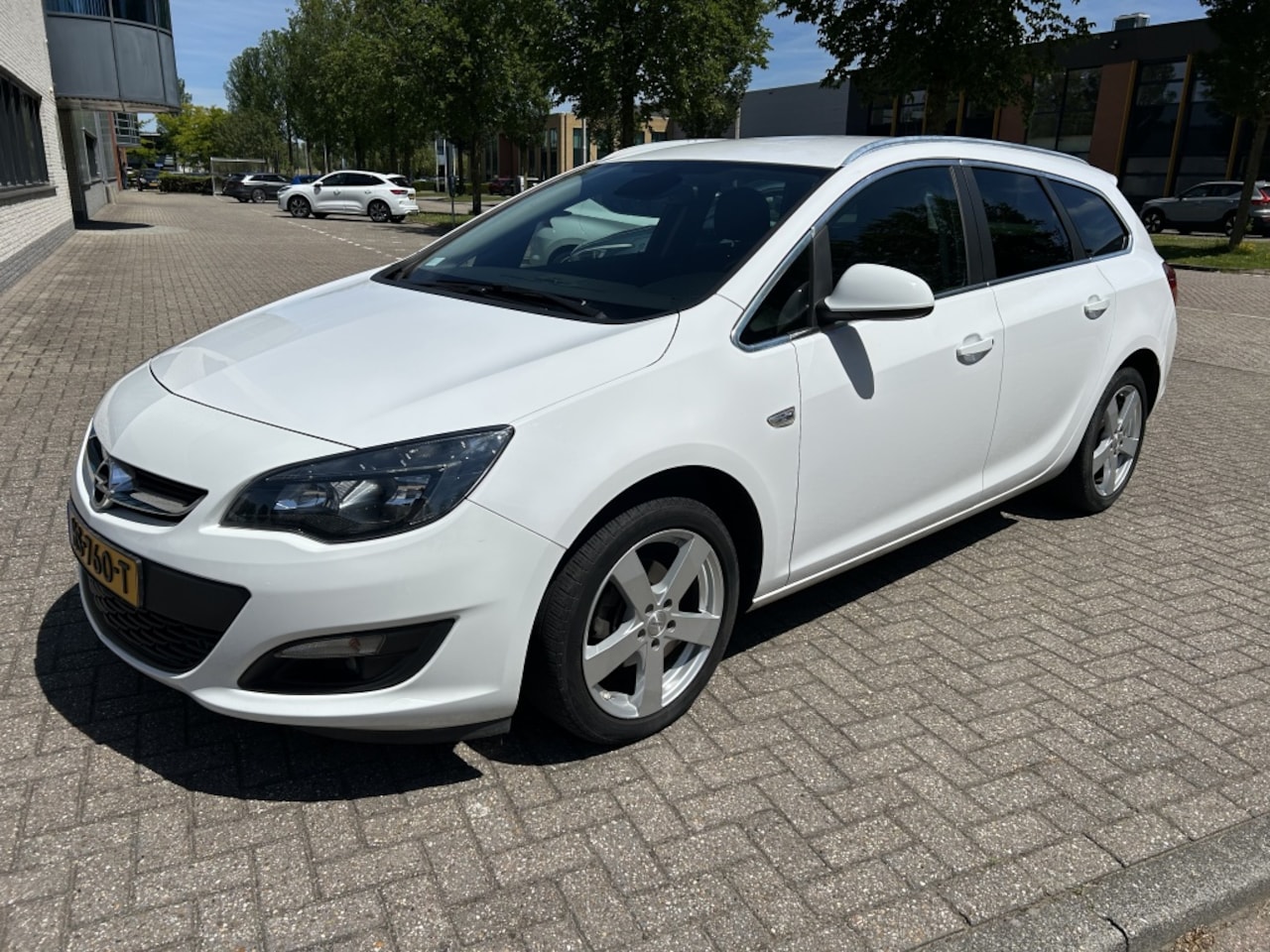 Opel Astra Sports Tourer - 1.4 Turbo Blitz NAVI CRUISE CLIMA PDC NAP! - AutoWereld.nl