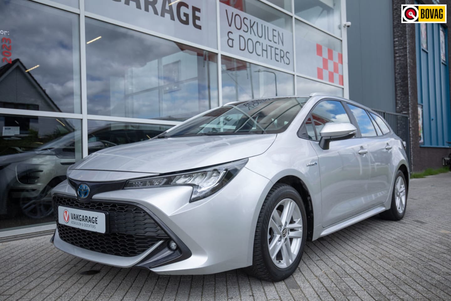 Toyota Corolla Touring Sports - 1.8 Hybrid Business |Carplay | Stoelverwarming - AutoWereld.nl