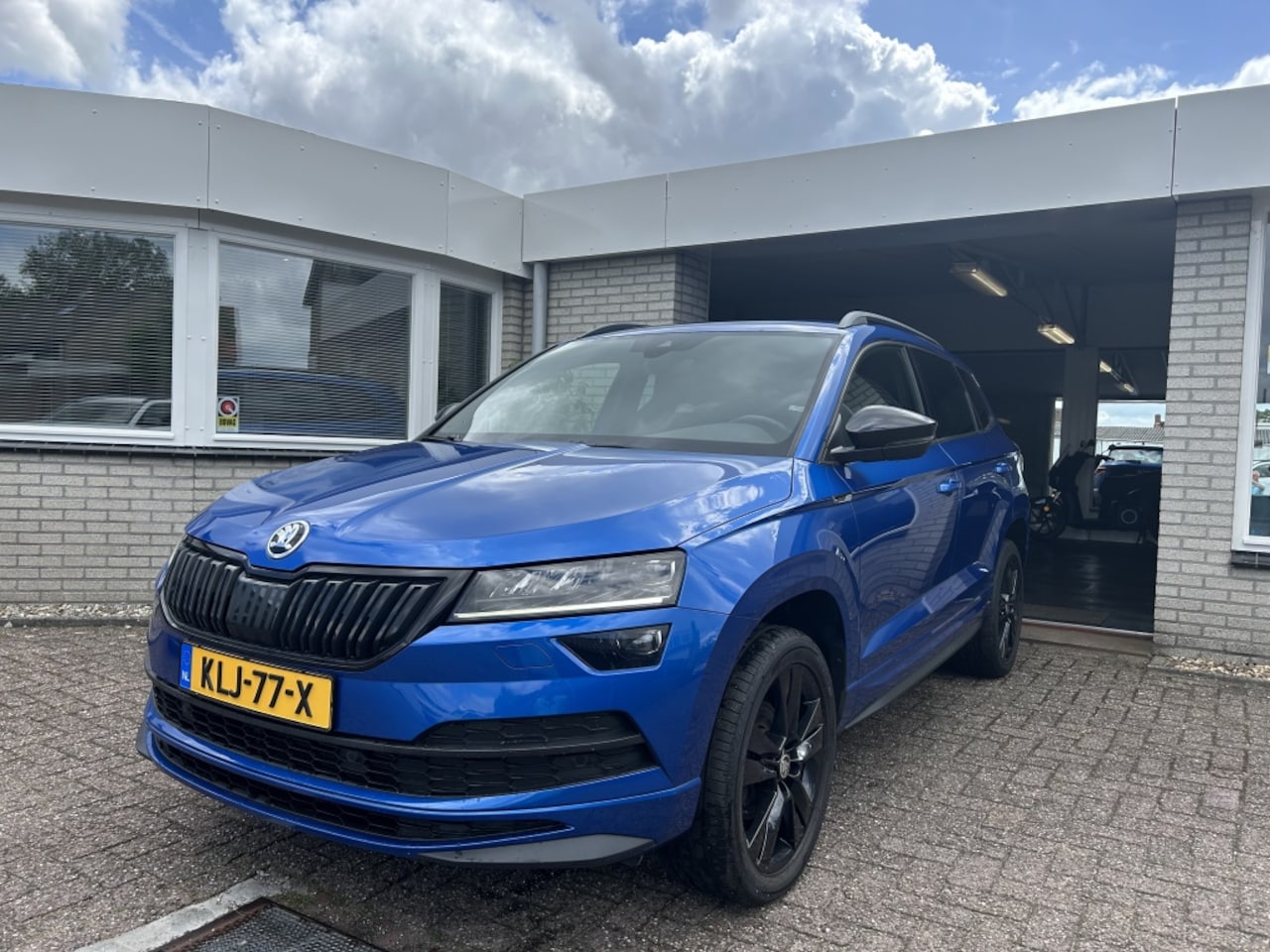 Skoda Karoq - 1.5 TSI 150pk Sportline AUTOMAAT - AutoWereld.nl