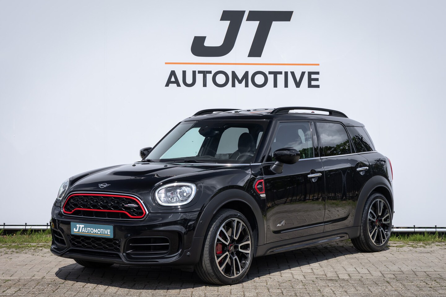 MINI Countryman - Mini 2.0 JCW ALL4 Chili NLAuto pano | Stoelverwarming | Harman Cardon | Voorruit verwarmin - AutoWereld.nl