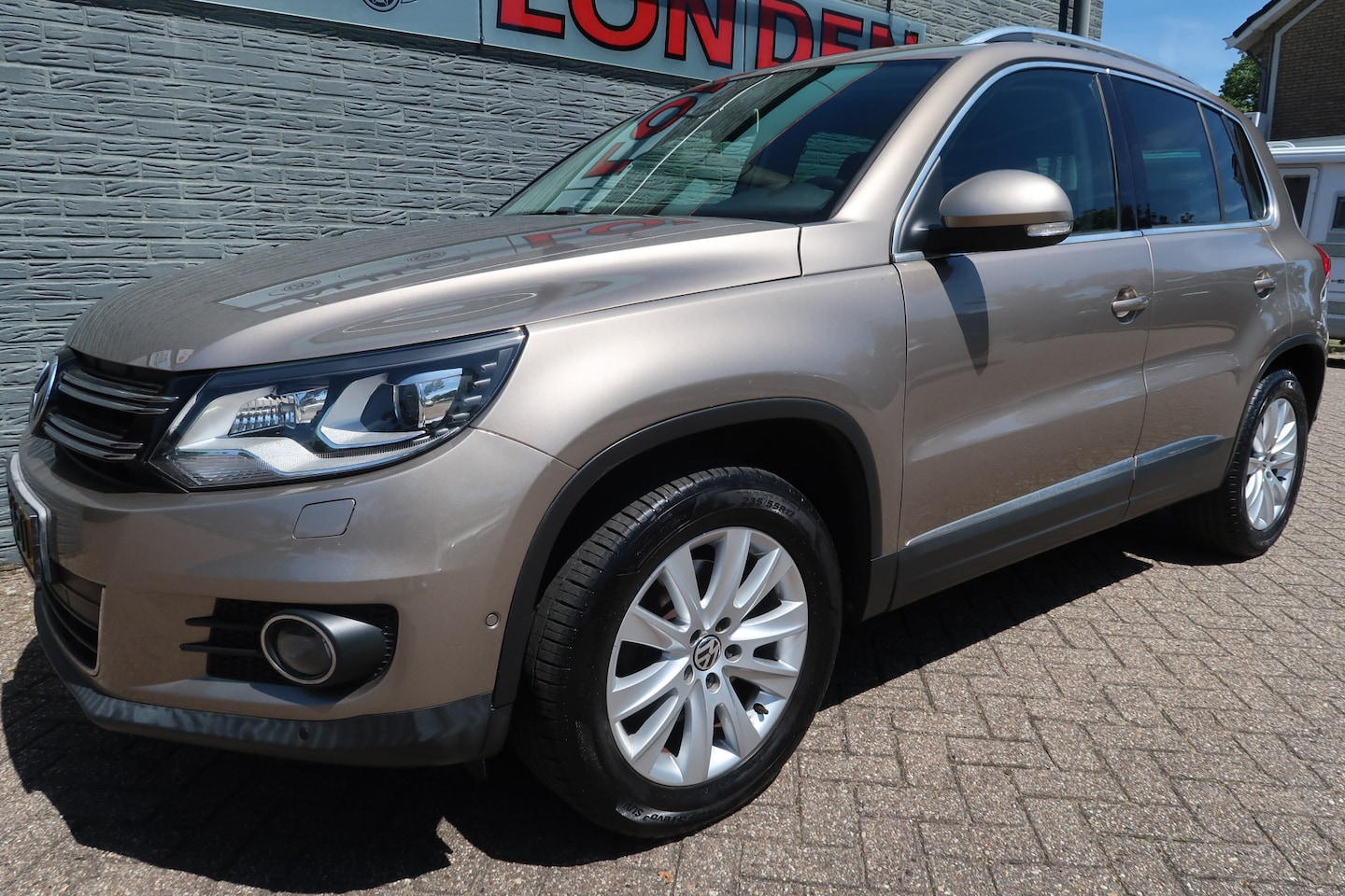 Volkswagen Tiguan - 1.4 TSI Sport&Style BlueMotion Bij ons bedrijf in onderhoud geweest - AutoWereld.nl
