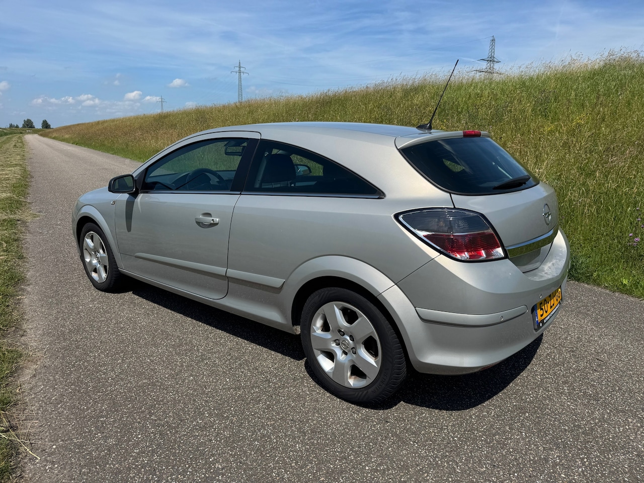 Opel Astra GTC - 1.6 Cosmo 1.6 Cosmo - AutoWereld.nl