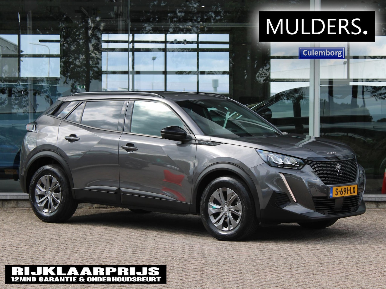 Peugeot 2008 - 1.2 PT 100pk Style | Camera/Navi/Dakrails - AutoWereld.nl