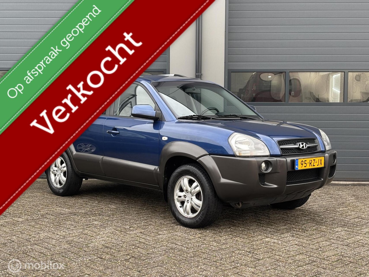 Hyundai Tucson - 2.0i Style Uitvoering APK 2027/Zeer nette Staat - AutoWereld.nl