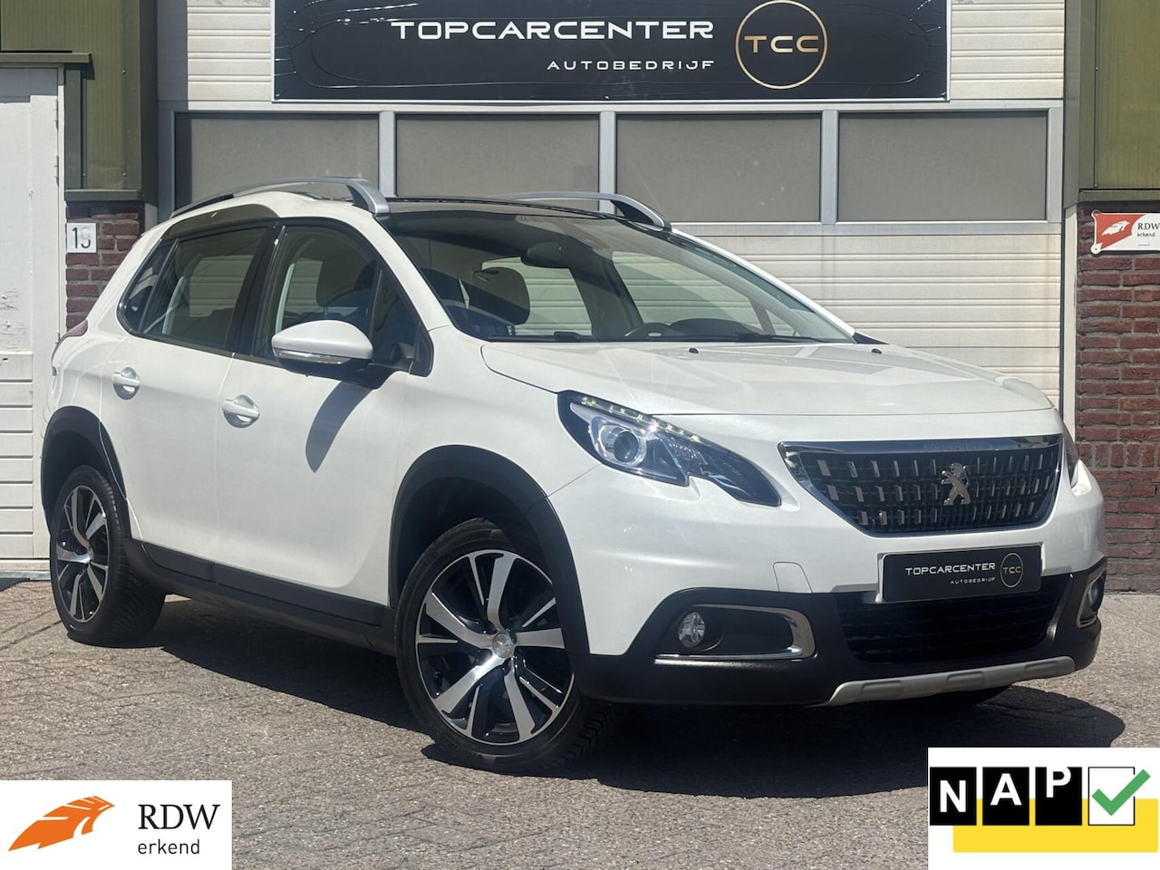 Peugeot 2008 - 1.2 Allure/AUTOM/CAMERA/PARKS/NAVI/APK/NAP - AutoWereld.nl