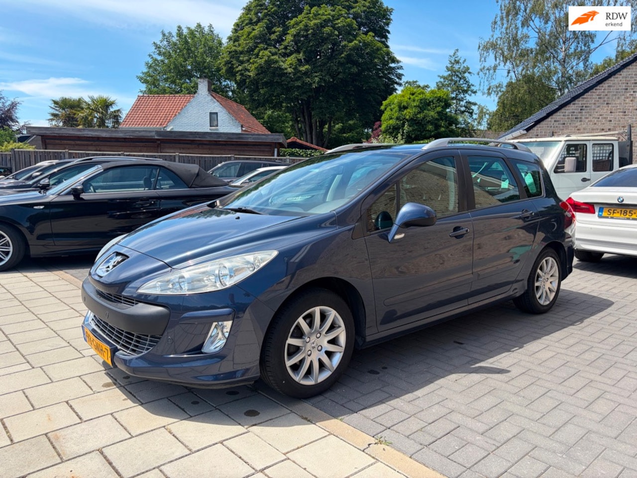 Peugeot 308 SW - 1.6 VTi XS Première nieuwe apk Airco PDC LMV trekhaak Panodak - AutoWereld.nl