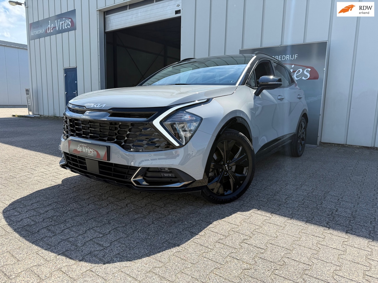 Kia Sportage - 1.6 T-GDi Hybrid Dark Edition / Airco / Navi / Stoelver. / Stuurverw / Trekhaak / Cruise c - AutoWereld.nl