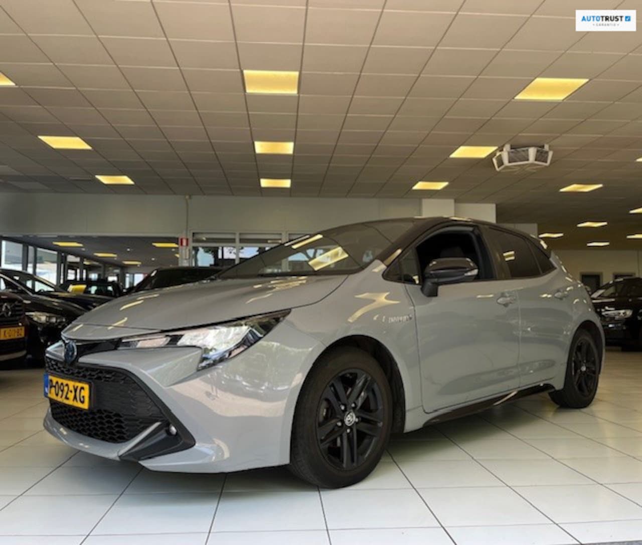 Toyota Corolla - 1.8 Hybrid Comfort/Apple Carplay/Camera/Navi/Cruise control/LED/Stoelverwarming/Airco - AutoWereld.nl