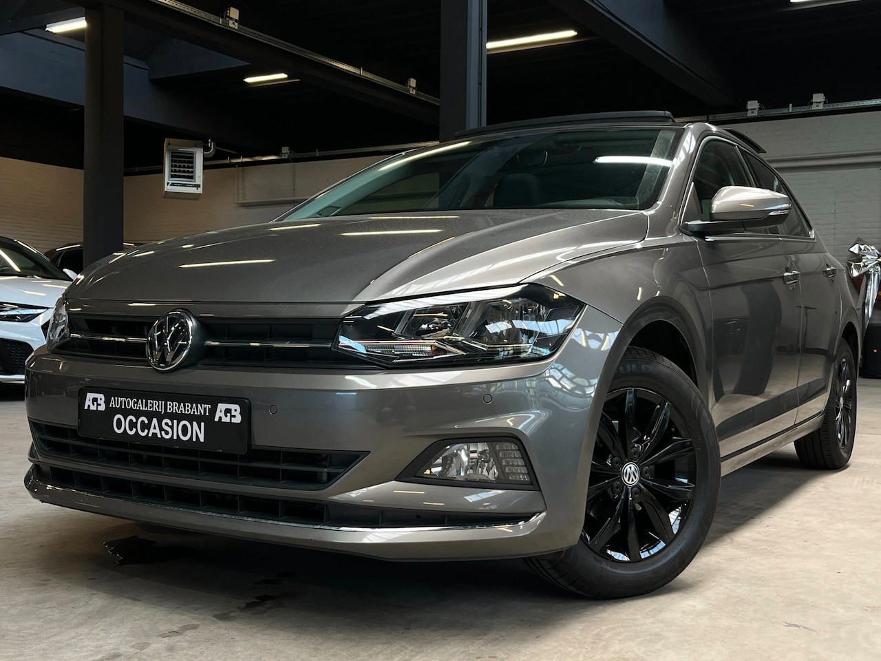 Volkswagen Polo - 1.0 TSI Highline Pano/Carplay/Navi/ACC - AutoWereld.nl