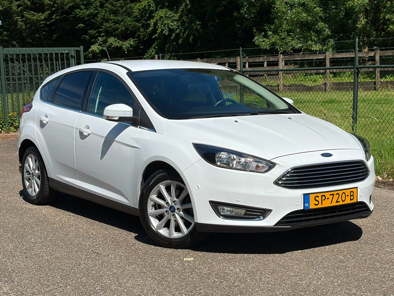 Ford Focus - 1.0 Titanium /NAP/Navi/Airco/ - AutoWereld.nl