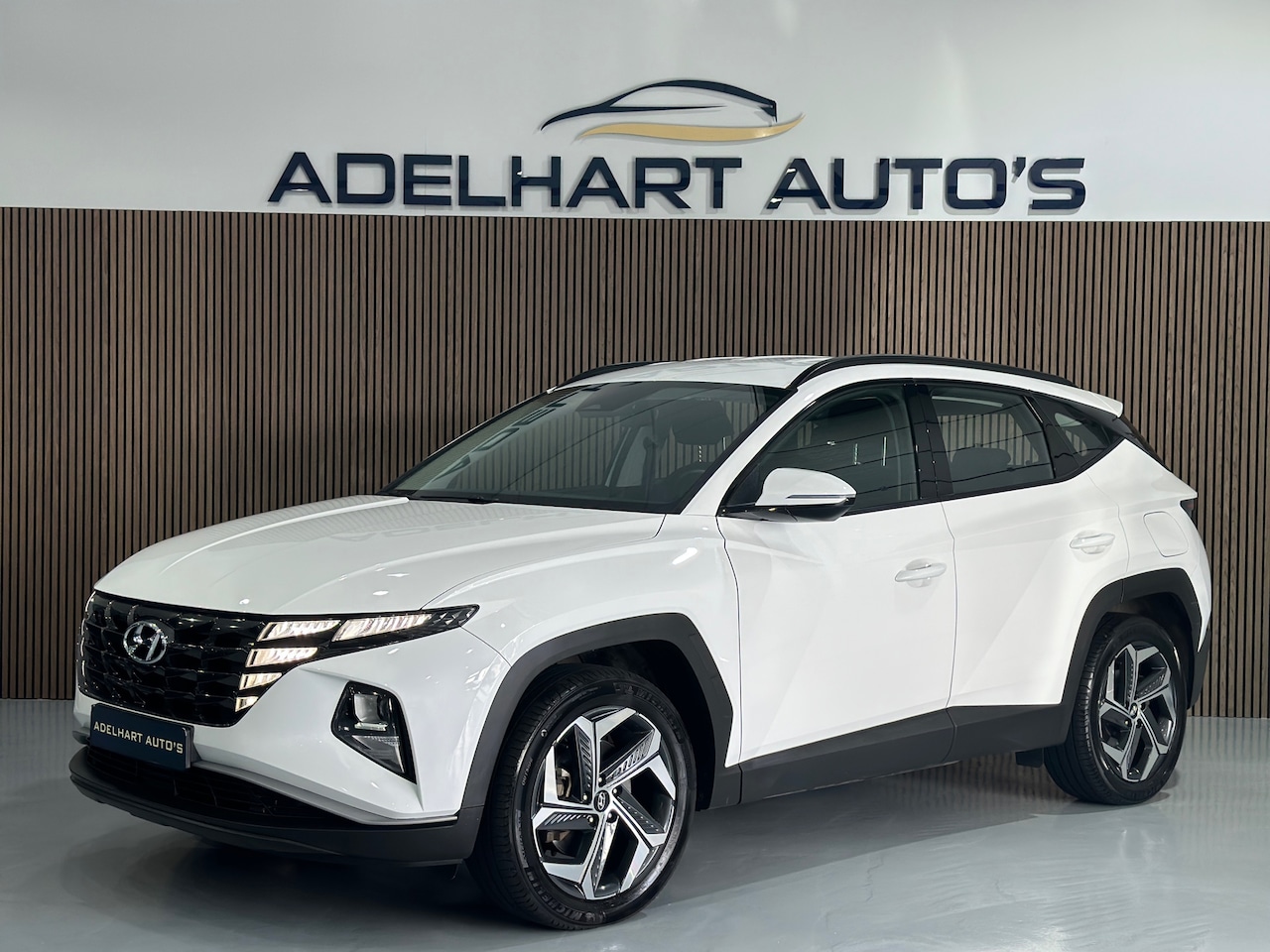 Hyundai Tucson - 1.6 T-GDI PHEV Comfort 265 PK Automaat / Navigatie full map / Camera / Cruise control / Cl - AutoWereld.nl