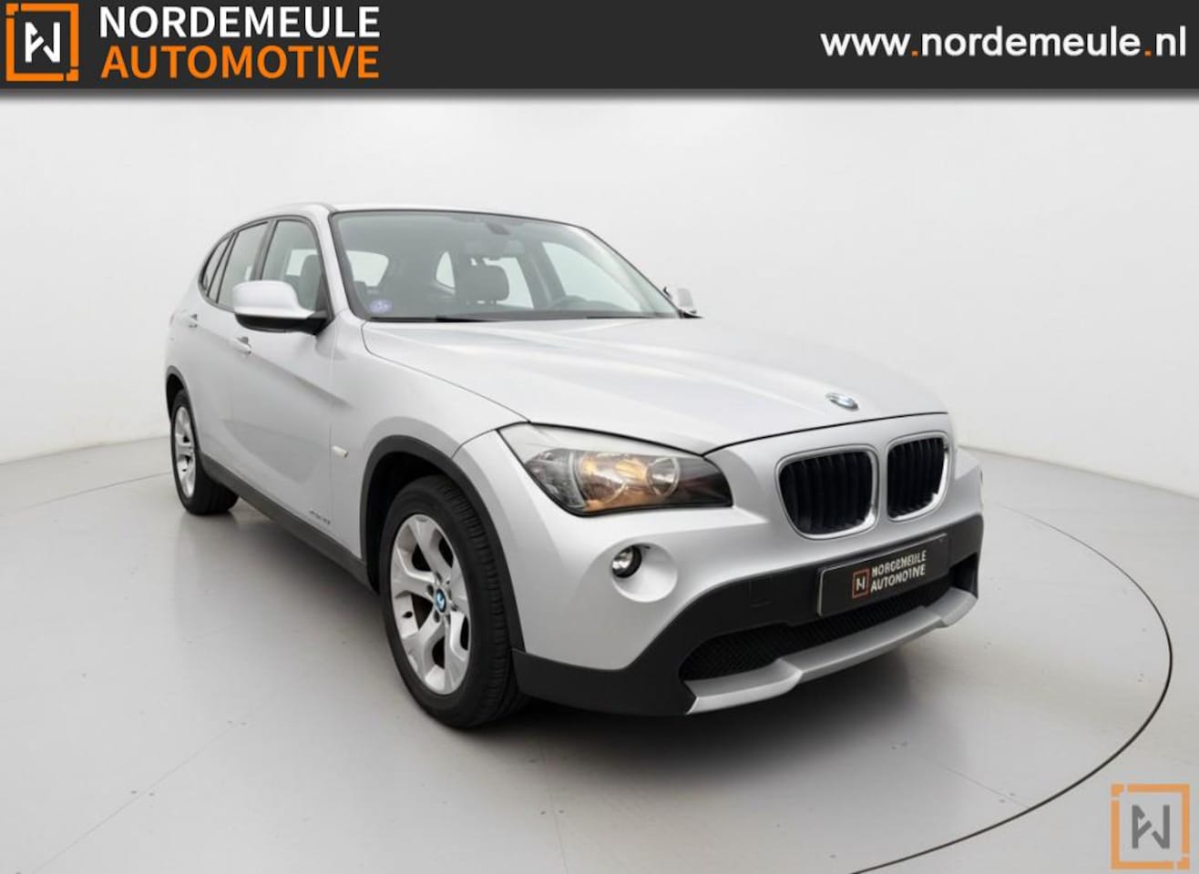 BMW X1 - XDRIVE20I BUSINESS. CRUISE, NAVI, TREKHAAK. - AutoWereld.nl