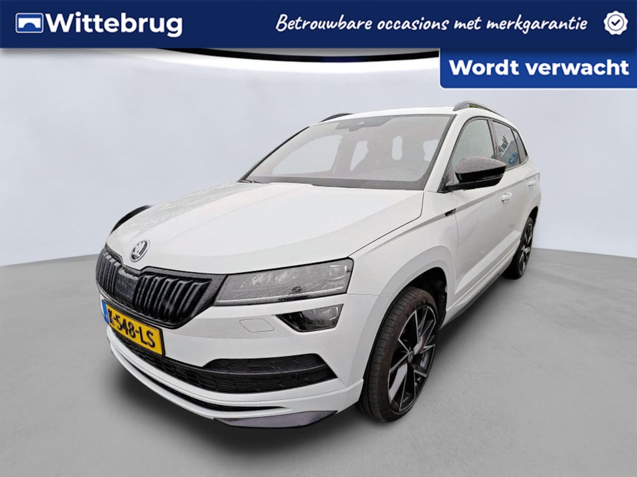 Skoda Karoq - 1.5 TSI ACT Sportline Business DSG Automaat / Panorama schuifdak / Camera / LM 19'' / LED - AutoWereld.nl