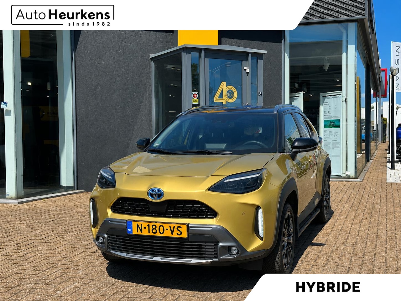 Toyota Yaris Cross - 1.5 Hybrid AWD Adventure | AUTOMAAT l Elektrische achterklep l Treeplanken - AutoWereld.nl