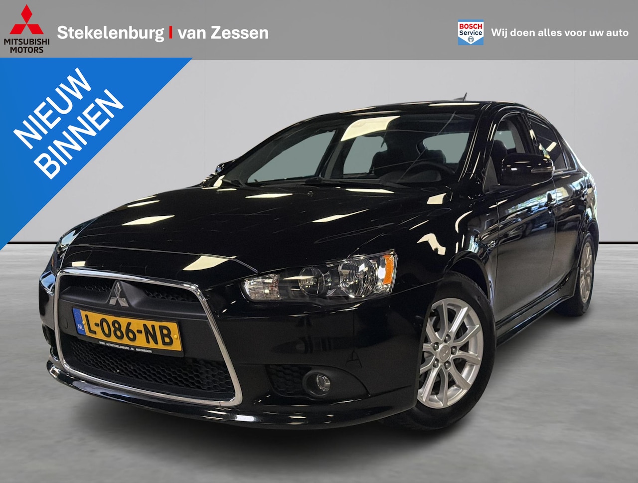 Mitsubishi Lancer Sportback - 1.6 Limited Edition Navigatie, Trekhaak - AutoWereld.nl