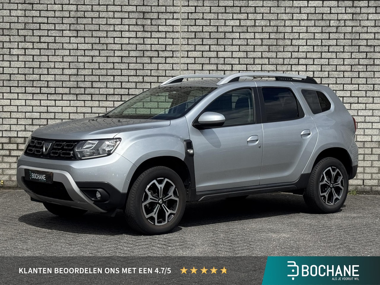 Dacia Duster - 1.0 TCe Prestige | Achteruitrijcamera | Navigatie | Climate Control | Bluetooth | - AutoWereld.nl