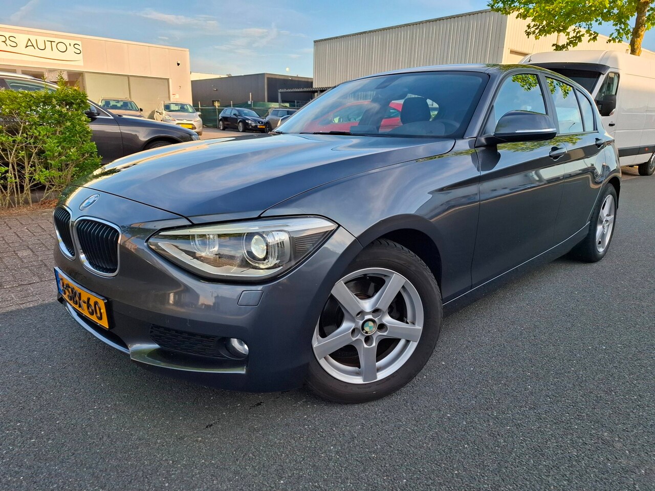 BMW 1-serie - 116i EDE Business CLIMA/CRUISE/NAVI/XENON! - AutoWereld.nl