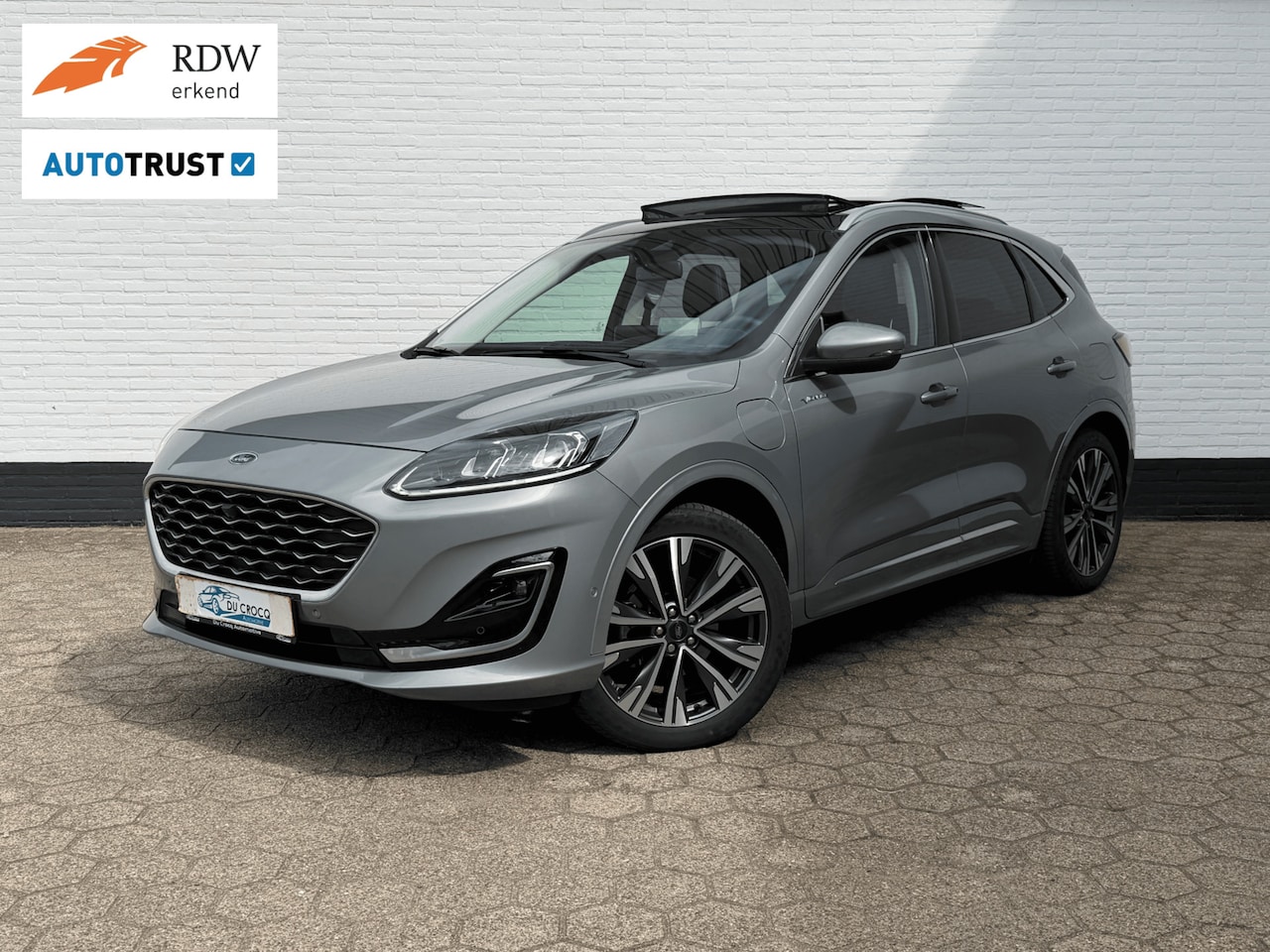 Ford Kuga - 2.5 PHEV Vignale l PANO l ACC l LEDER l TREKHAAK! - AutoWereld.nl