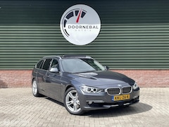 BMW 3-serie Touring - 328i Luxury / ZWITSERS / PANORAMA / DAB