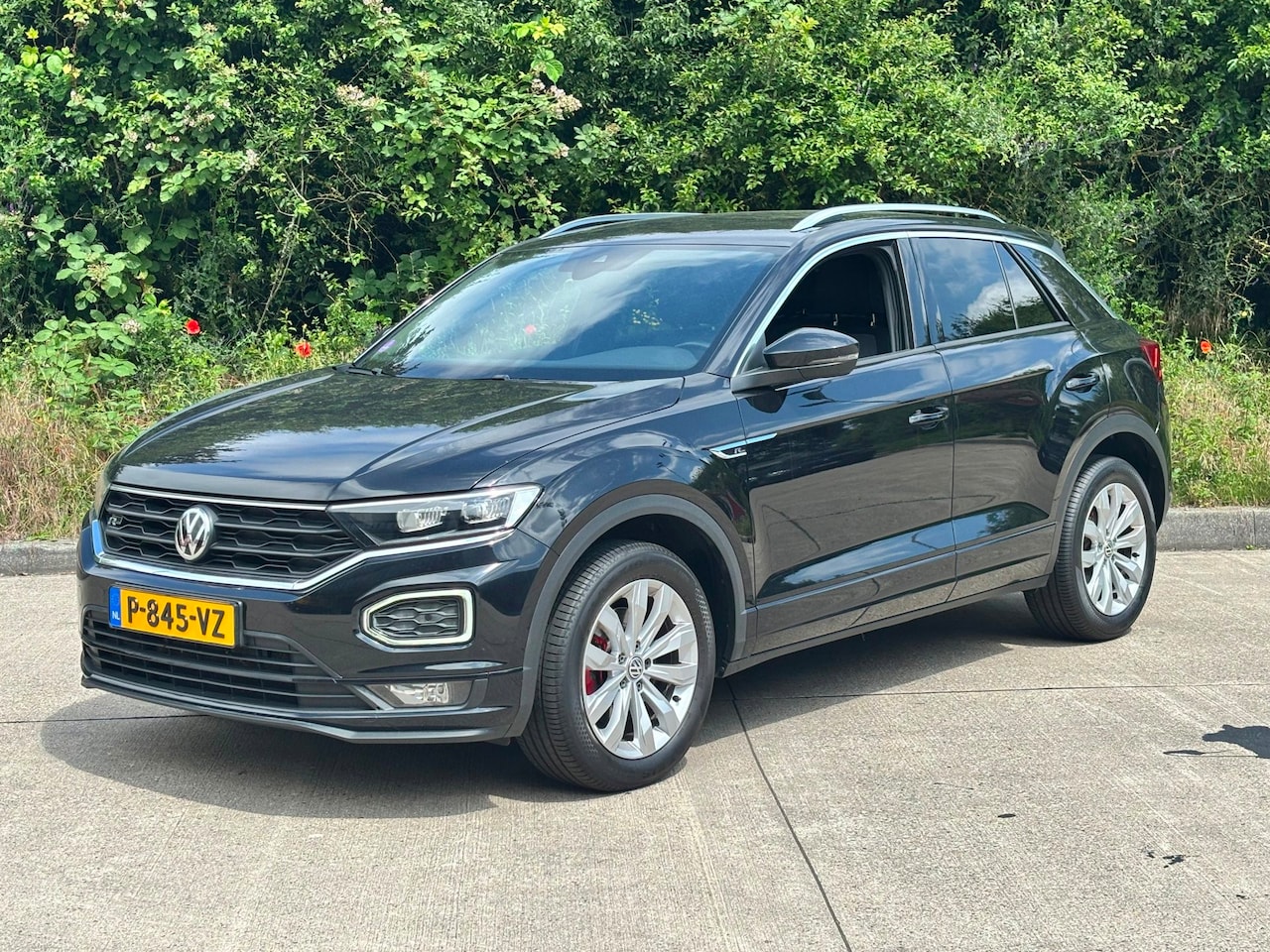 Volkswagen T-Roc - 1.5 TSI Sport Business R 1.5 TSI Sport Business R - AutoWereld.nl