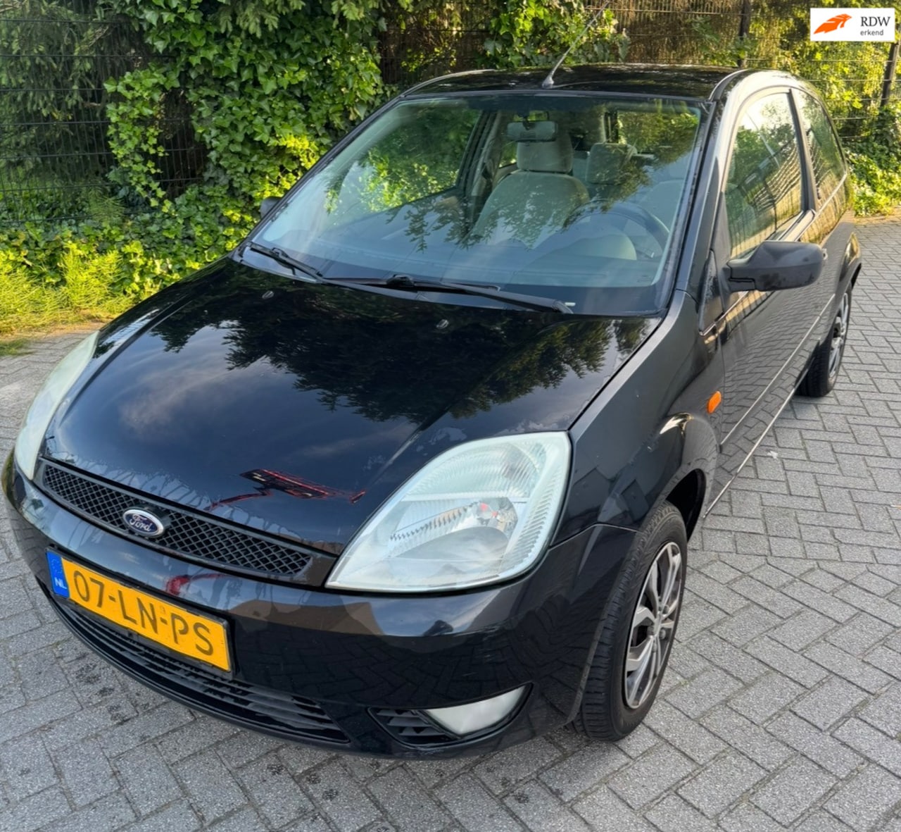Ford Fiesta - 1.4-16V Ghia 1.4-16V Ghia - AutoWereld.nl
