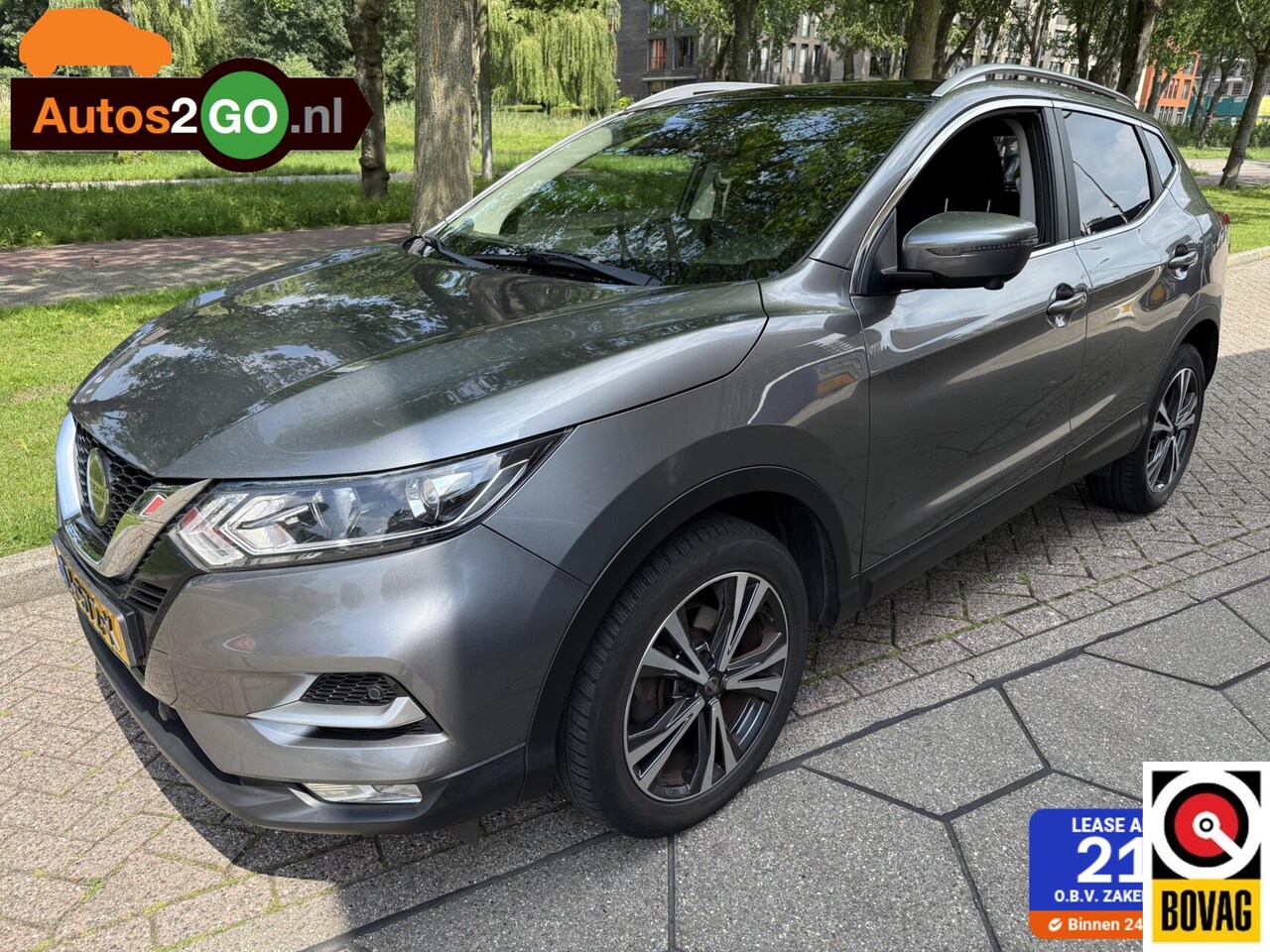 Nissan Qashqai - 1.2 Tekna I Navi I camera I cruise controle I pan. dak I parkeerhulp I rijklaar I - AutoWereld.nl