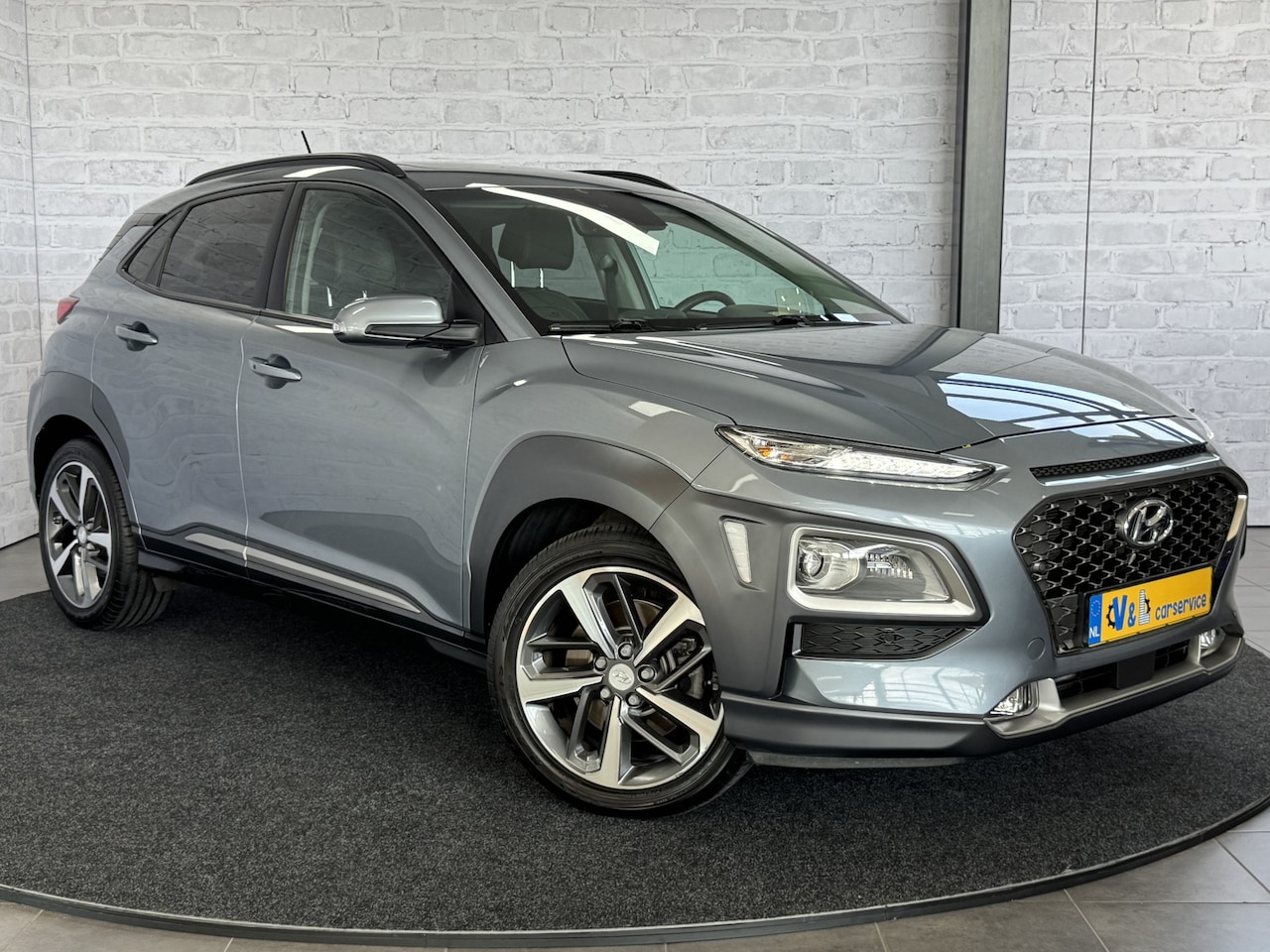 Hyundai Kona - 1.6 T-GDI Premium 4WD Pano Trekhaak HUD Keyless Leder Carplay - AutoWereld.nl