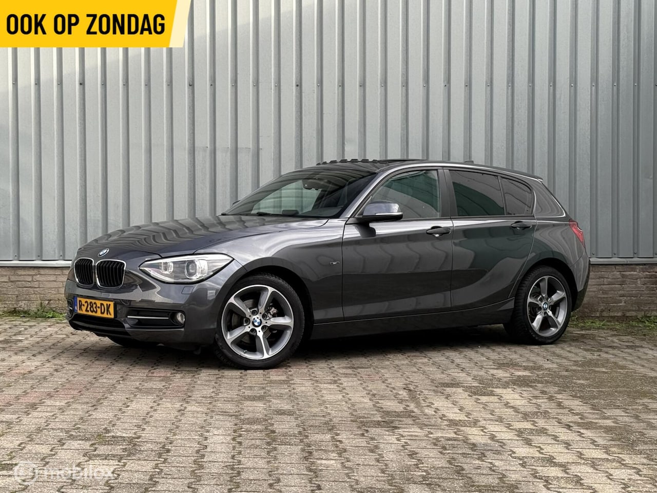 BMW 1-serie - 116i Sport High Executive | Schuifdak | Climate - AutoWereld.nl
