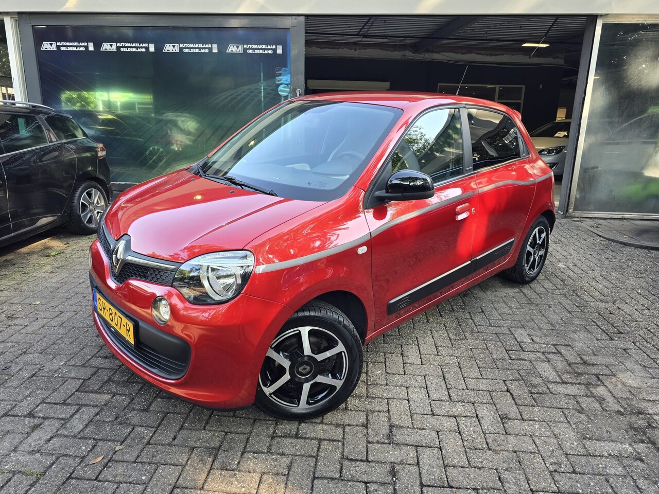 Renault Twingo - 1.0 SCe Limited | 1E EIGENAAR | 12MND GARANTIE | AUTOMAAT | CRUISE | LMV | - AutoWereld.nl