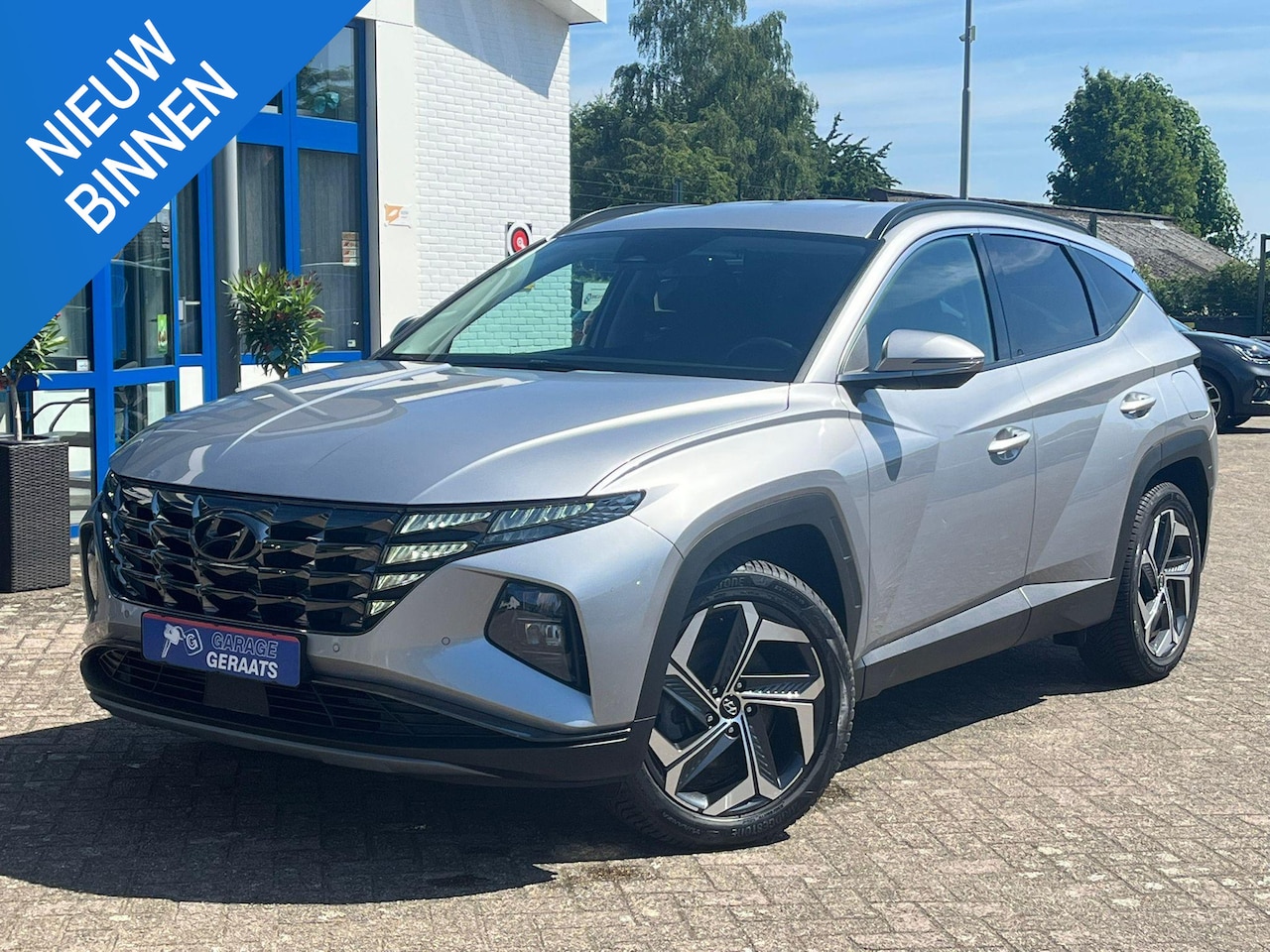 Hyundai Tucson - 1.6 T-GDI PHEV Comfort Smart 4WD l Stoelverwarming, Stuurwielverwarming, Navigatie, Adapti - AutoWereld.nl