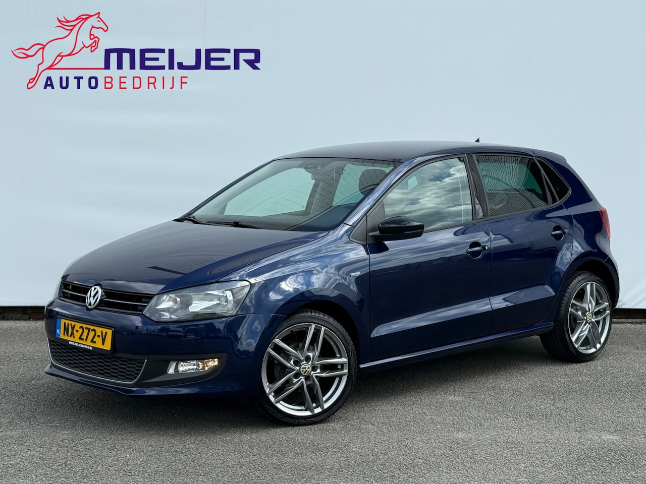 Volkswagen Polo - 1.2-12V BlueMotion Comfortline Navigatie | Clima | Cruise | Sportvelgen | Stoelverwarming - AutoWereld.nl
