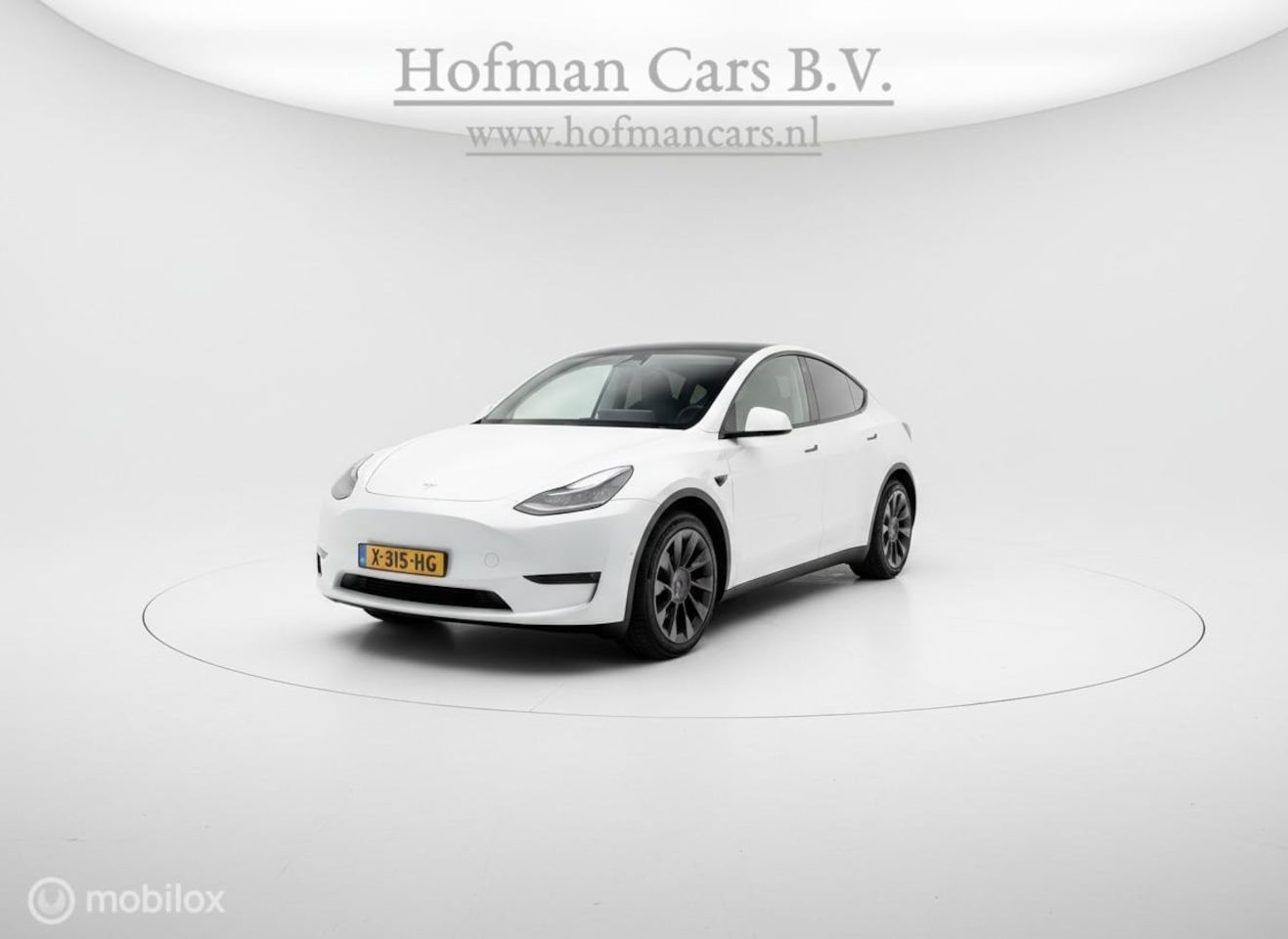 Tesla Model Y - RWD | SOH 92% | Pearl White | Originele Afneembare Trekhaak | 20" Zwarte Velgen | 11/2023 - AutoWereld.nl