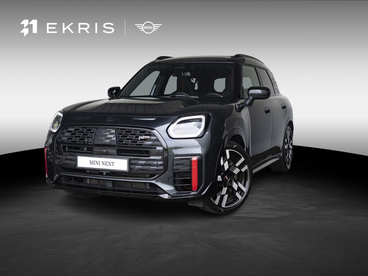 MINI Countryman - JCW ALL4 John Cooper Works XL-pakket | 20" Flag Spoke 2-tone | Glazen panoramadak | Stoel - AutoWereld.nl